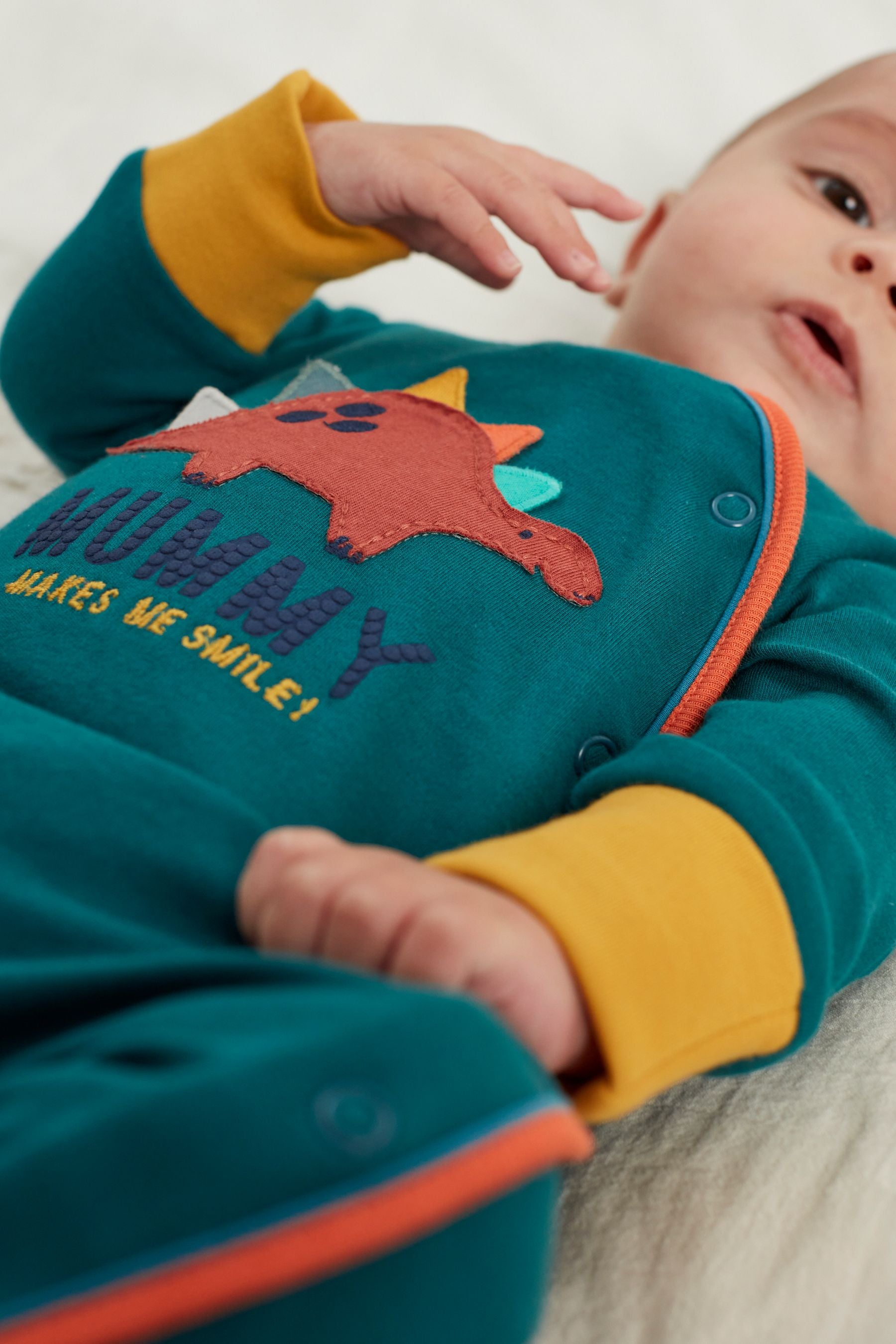 Blue Mummy Dinosaur Single Sleepsuit (0-2yrs)