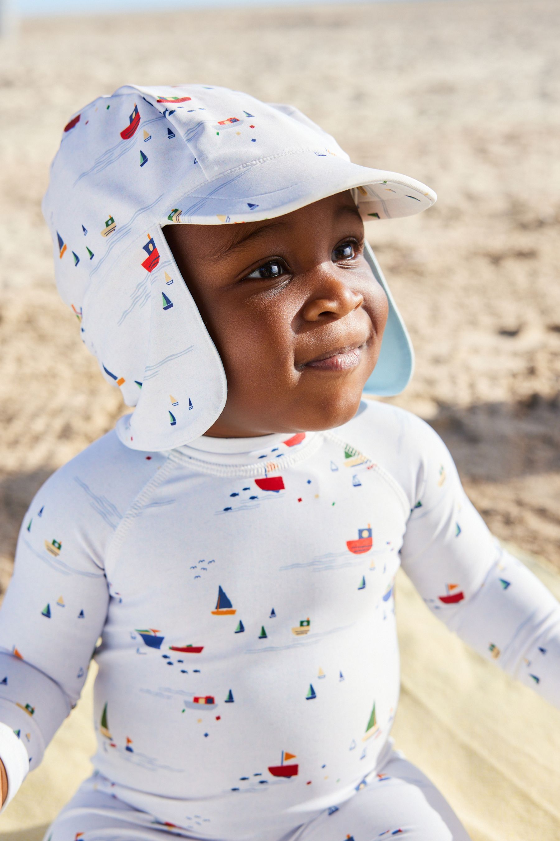 Pale Blue Boats Sunsafe Swimsuit & Hat 2 Piece Set (3mths-7yrs)