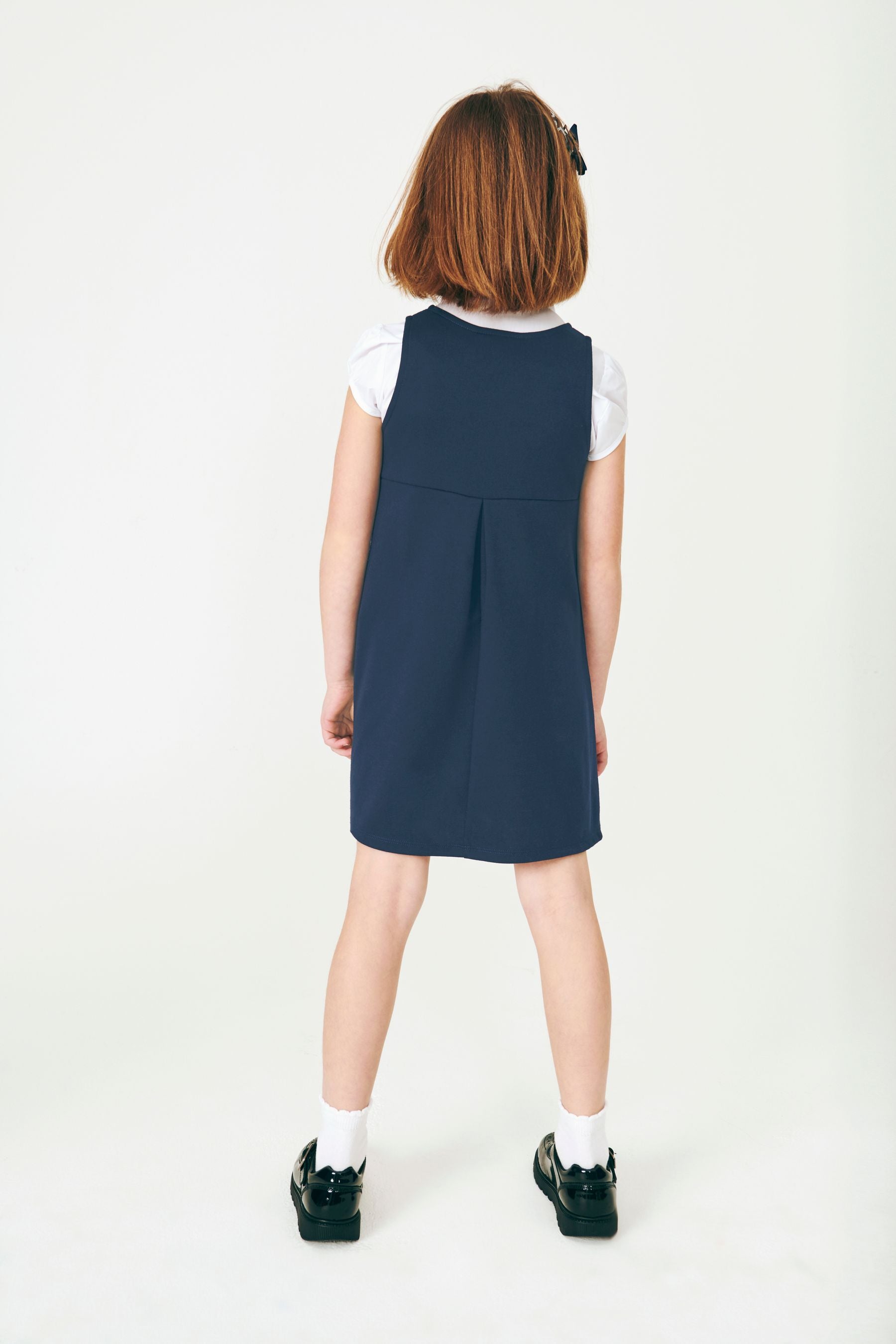 Navy Jersey Stretch Bow School Pinafore (3-14yrs)