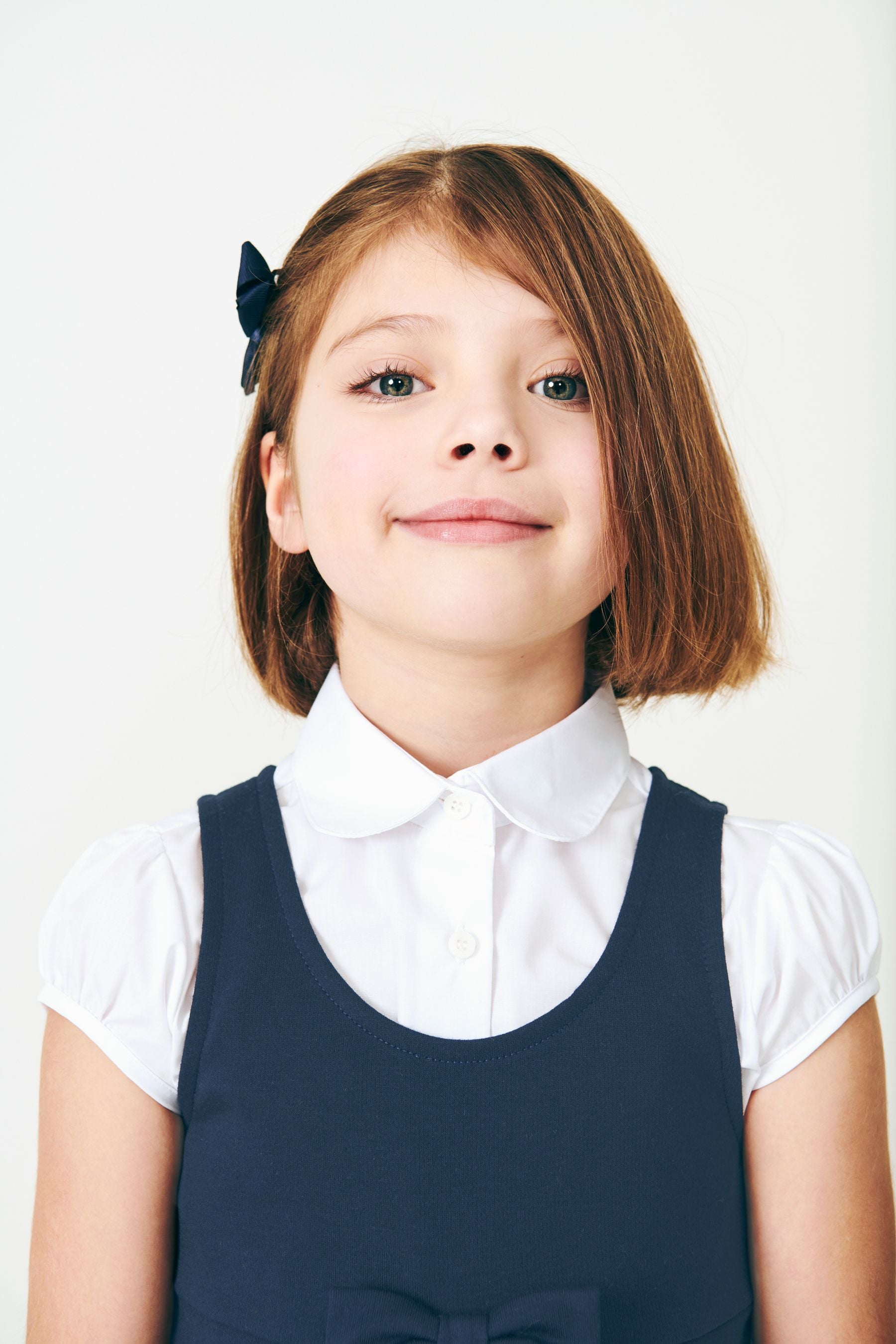 Navy Jersey Stretch Bow School Pinafore (3-14yrs)