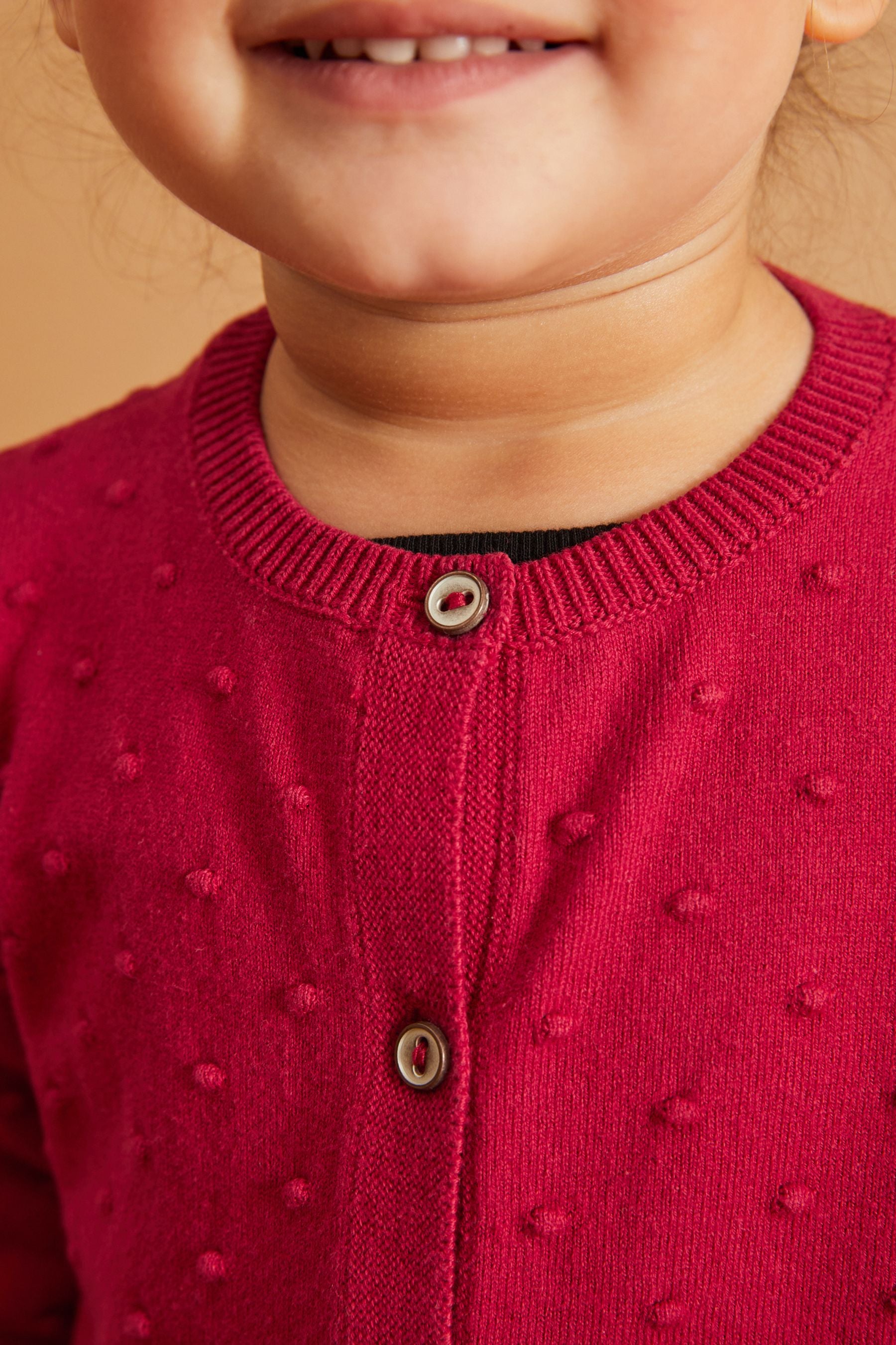 Red Bobble Cardigan (3mths-10yrs)