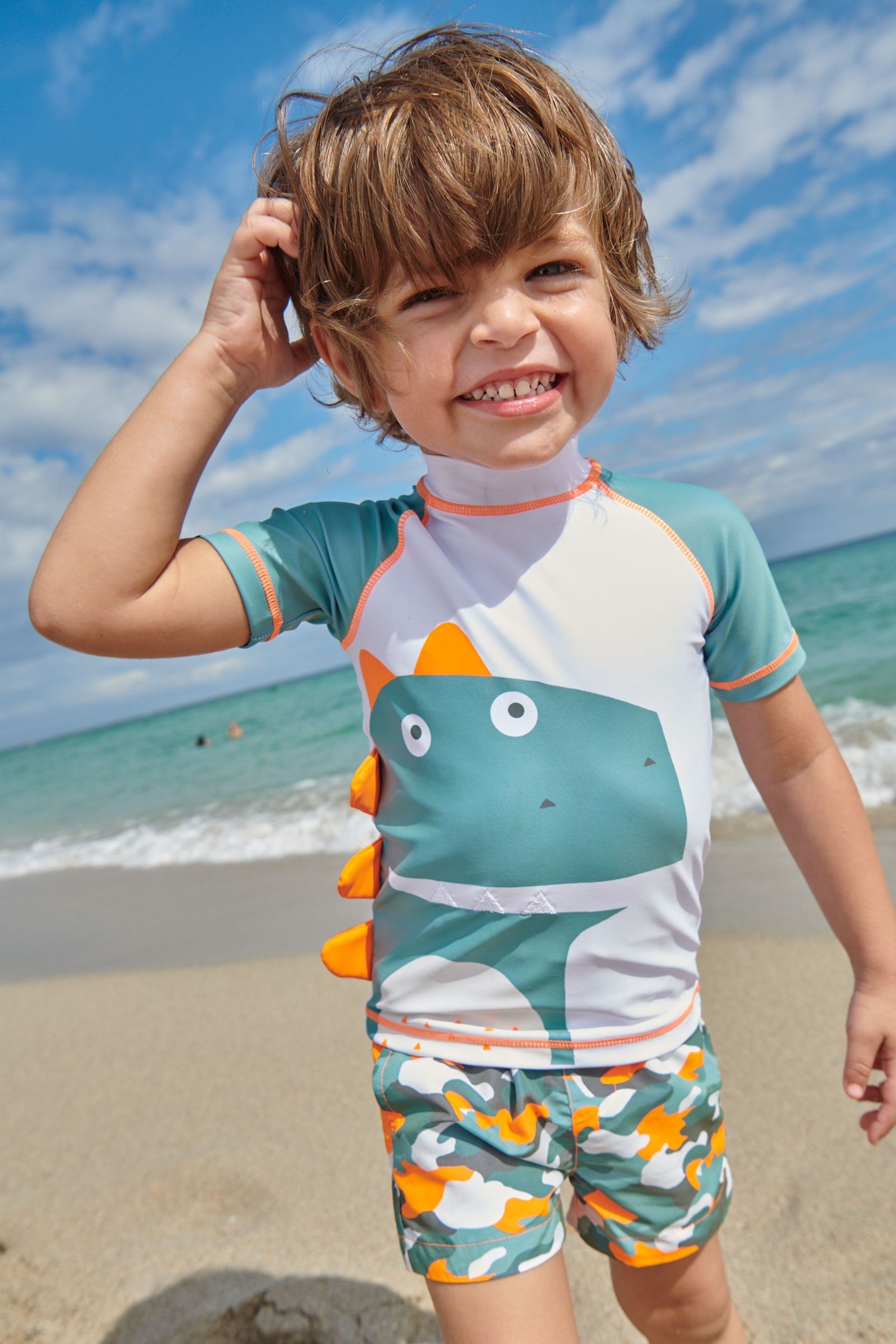 Green Dinosaur 2 Piece Rash Vest And Shorts Set (3mths-7yrs)