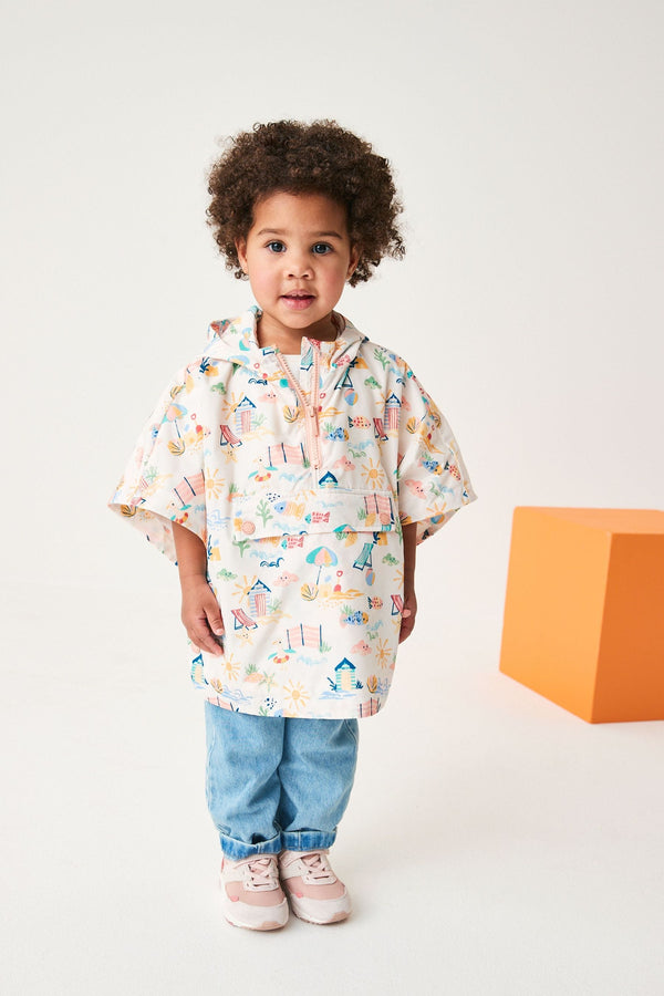 Cream Character Beach Shower Resistant Overhead Printed Pack Away Poncho Cagoule (3mths-7yrs)