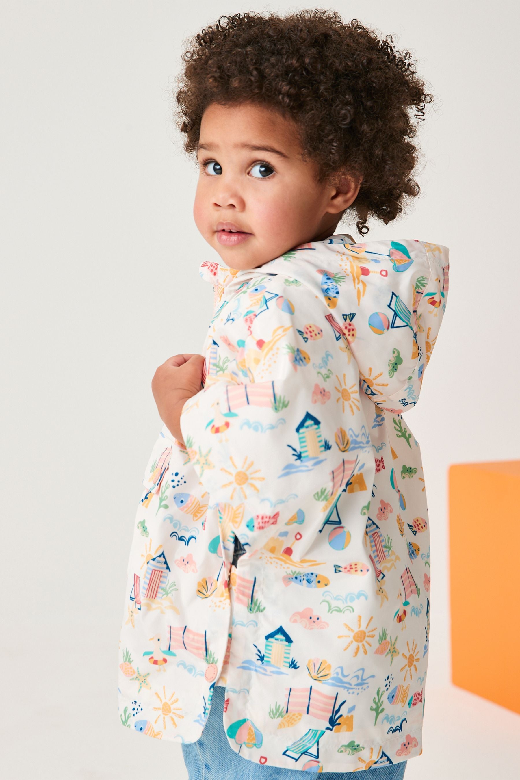 Cream Character Beach Shower Resistant Overhead Printed Pack Away Poncho Cagoule (3mths-7yrs)