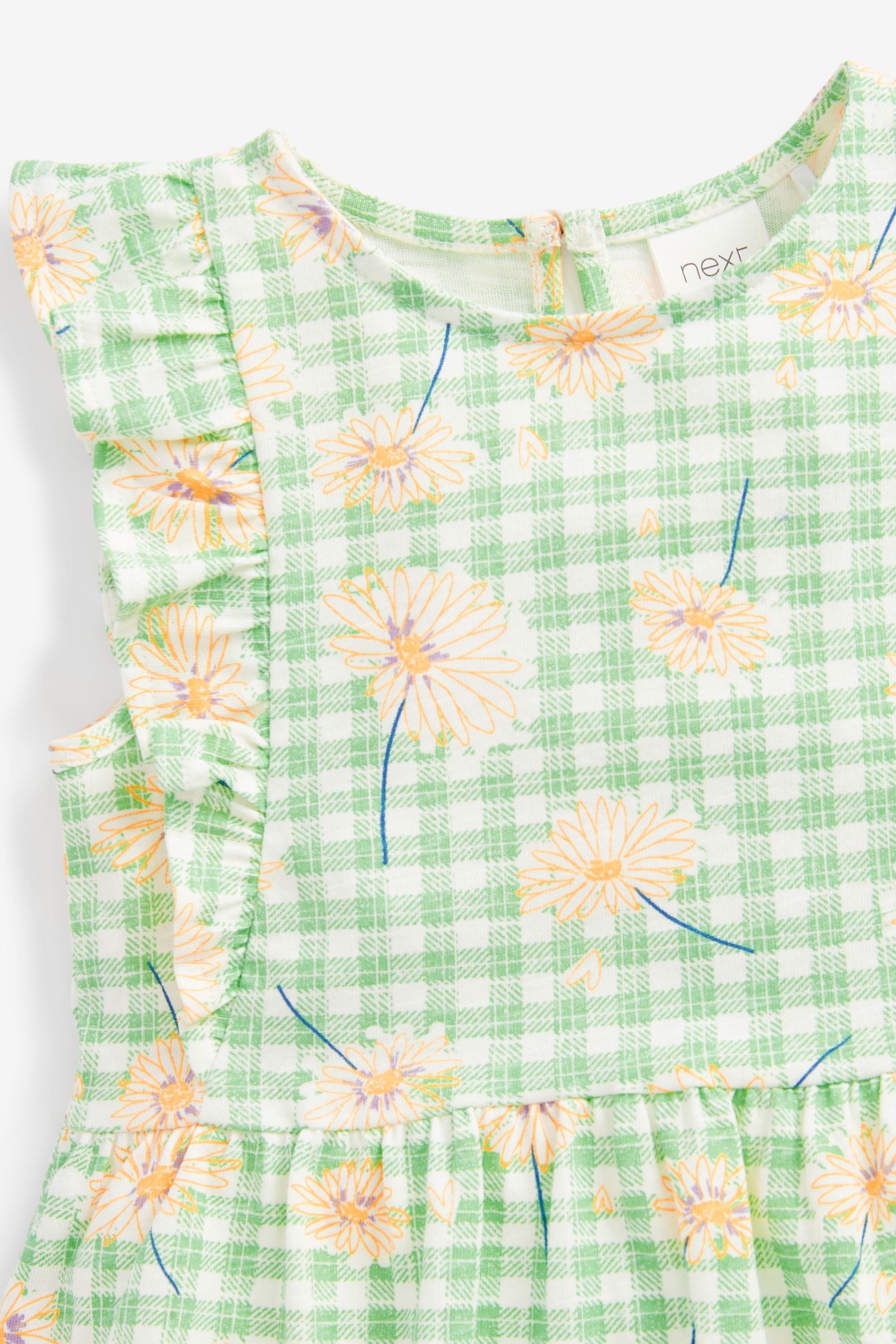 Green Daisy Peplum Vest (3mths-7yrs)