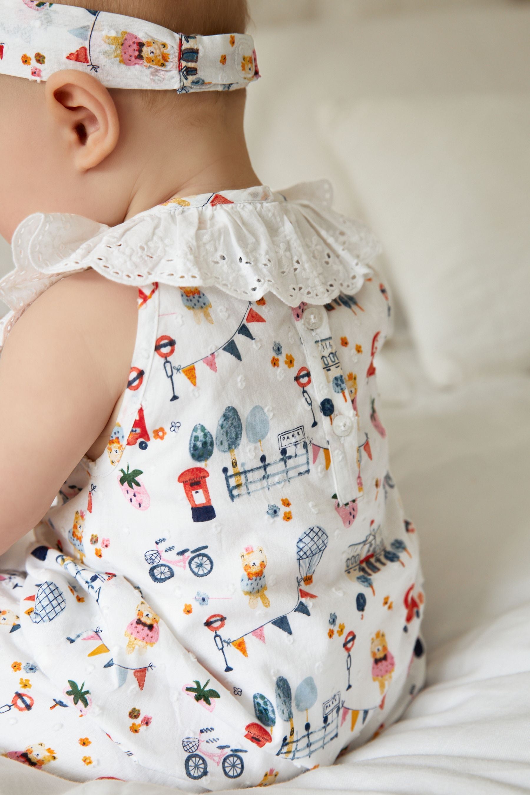 White Jubilee Baby Woven Collared Character Print Romper and Headband Set (0mths-2yrs)