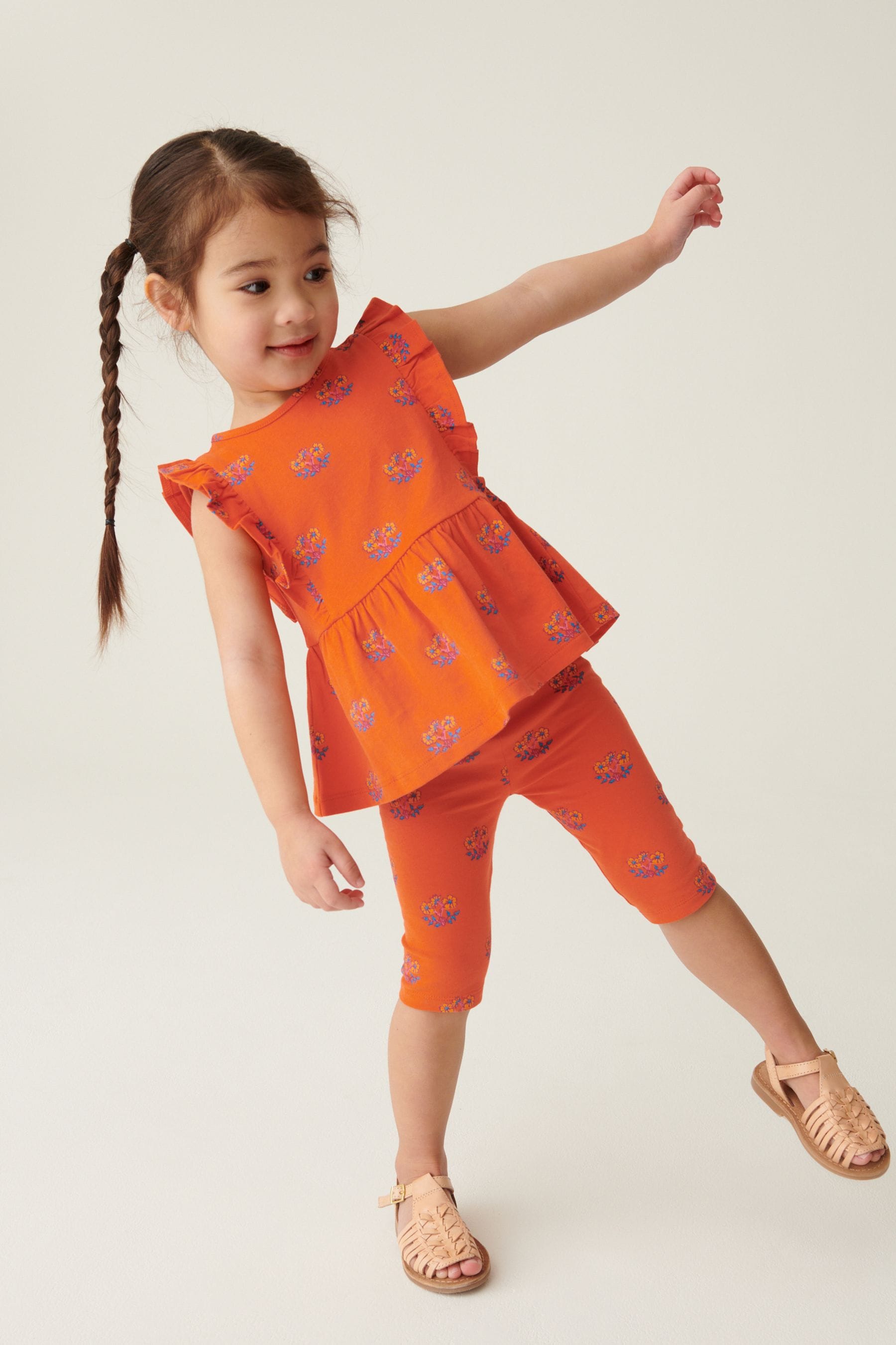 Orange Geo Ditsy Cotton Frill Peplum Vest (3mths-7yrs)