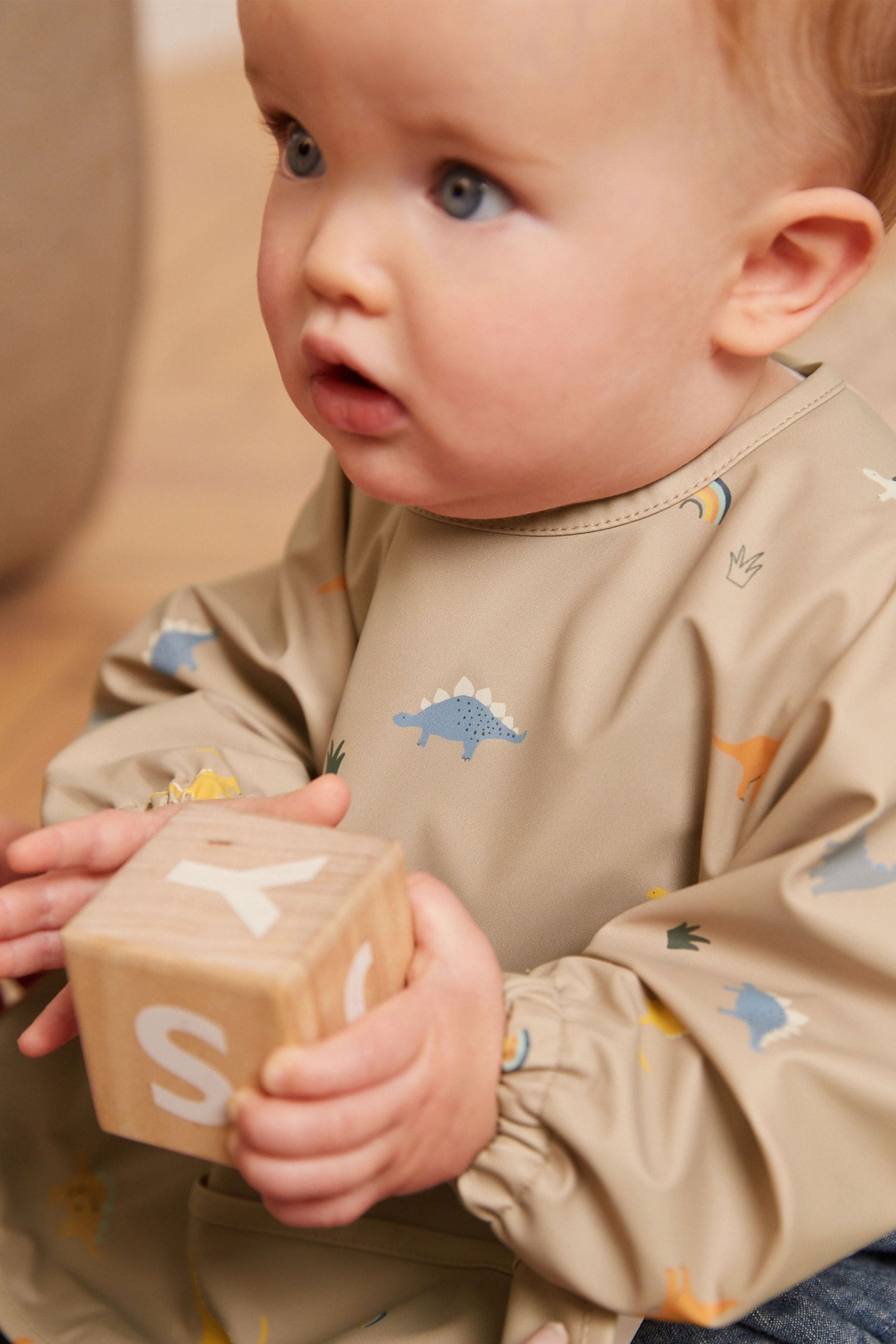 Beige Cream Dinosaur Baby Weaning and Feeding Sleeved Bib (6mths-3yrs)