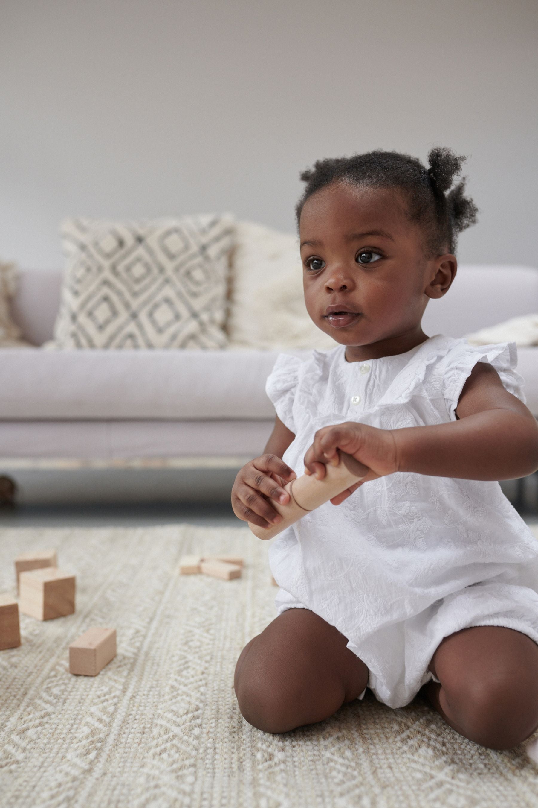 White Broiderie Baby Playsuit (0mths-2yrs)