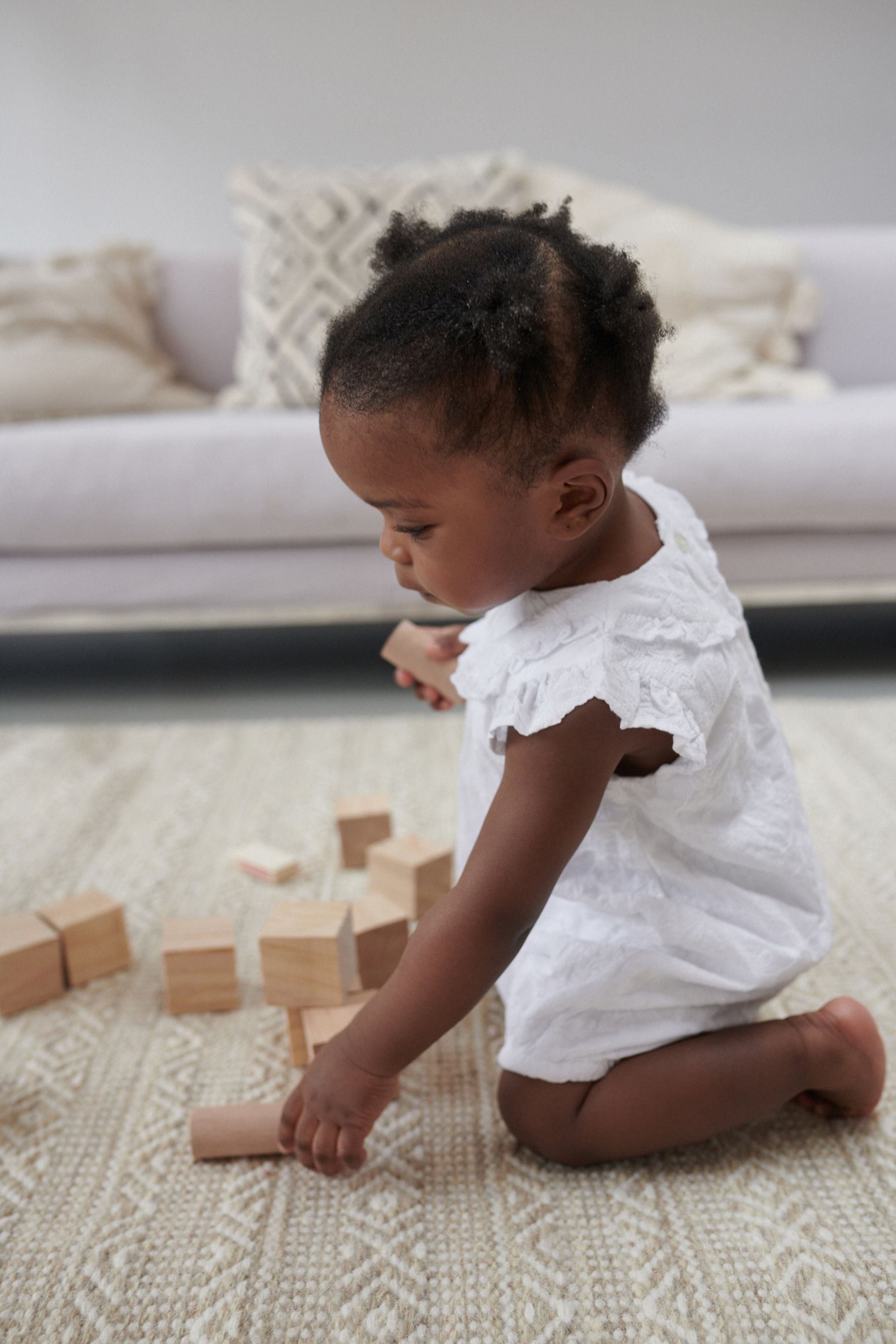 White Broiderie Baby Playsuit (0mths-2yrs)