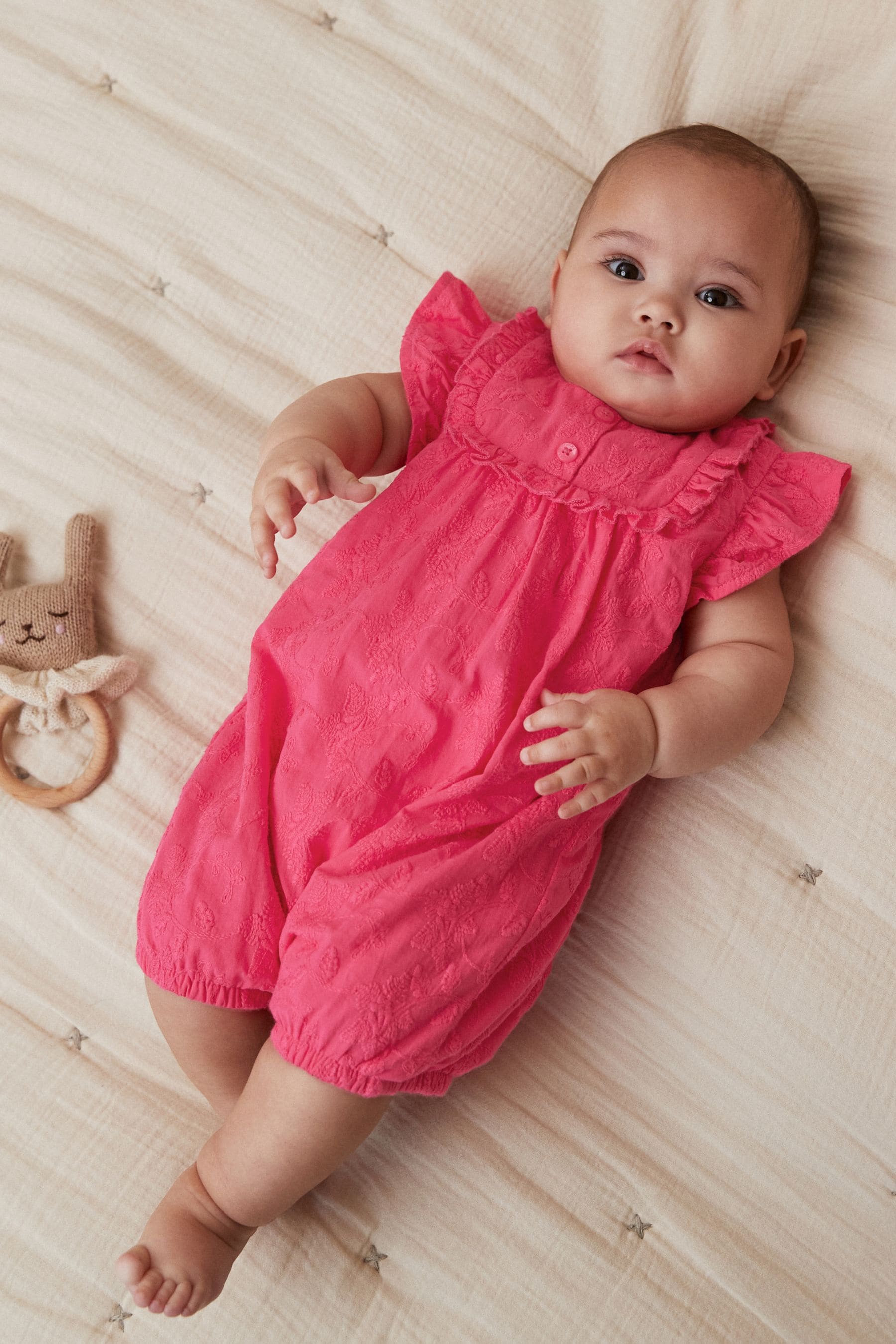 Pink Baby Broiderie Romper (0mths-2yrs)