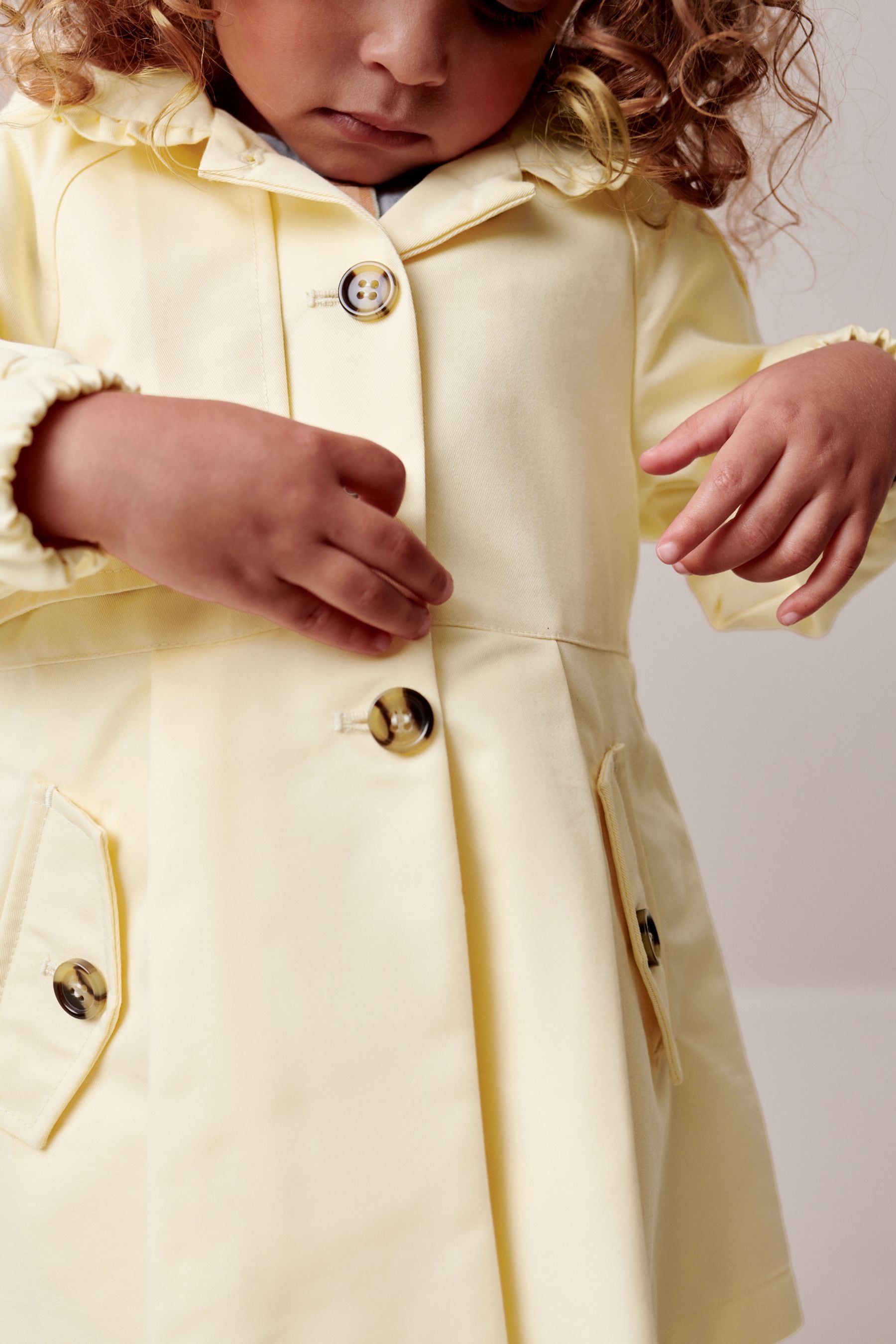 Yellow Shower Resitant Frill Collar Smart Cotton Jacket (3mths-7yrs)