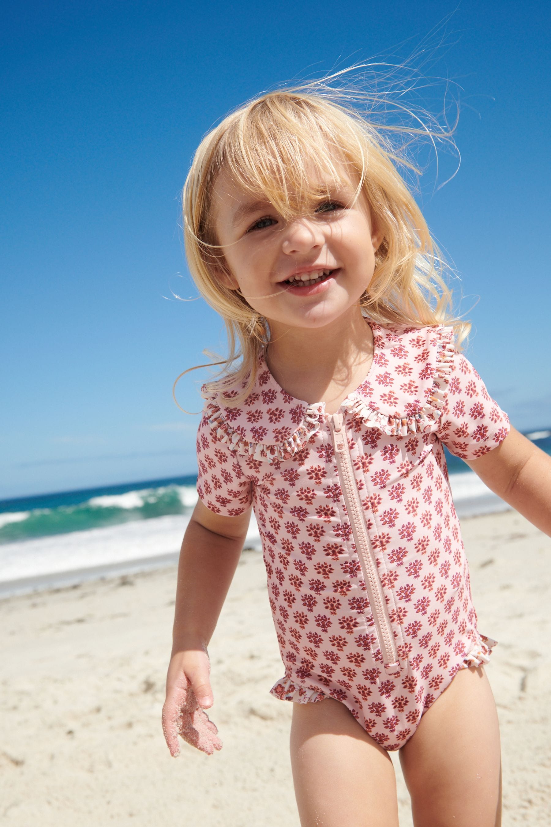 Pink Ditsy Collared Short Sleeve Swimsuit (3mths-7yrs)