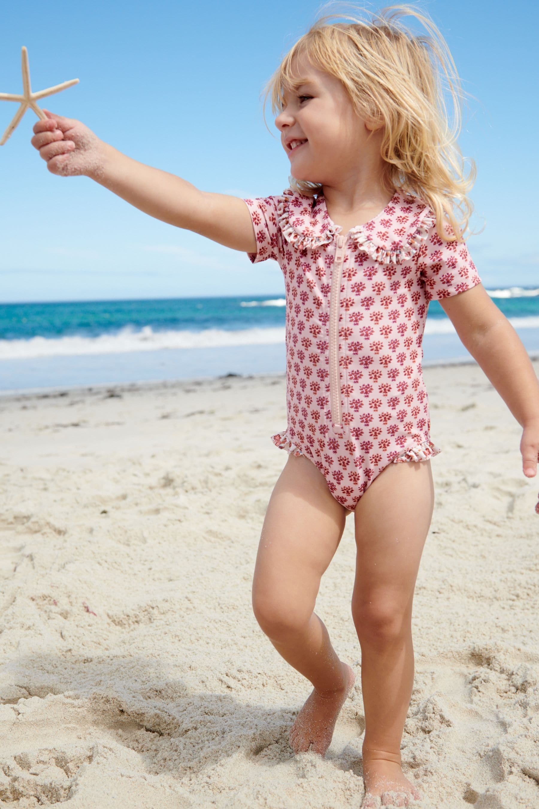 Pink Ditsy Collared Short Sleeve Swimsuit (3mths-7yrs)