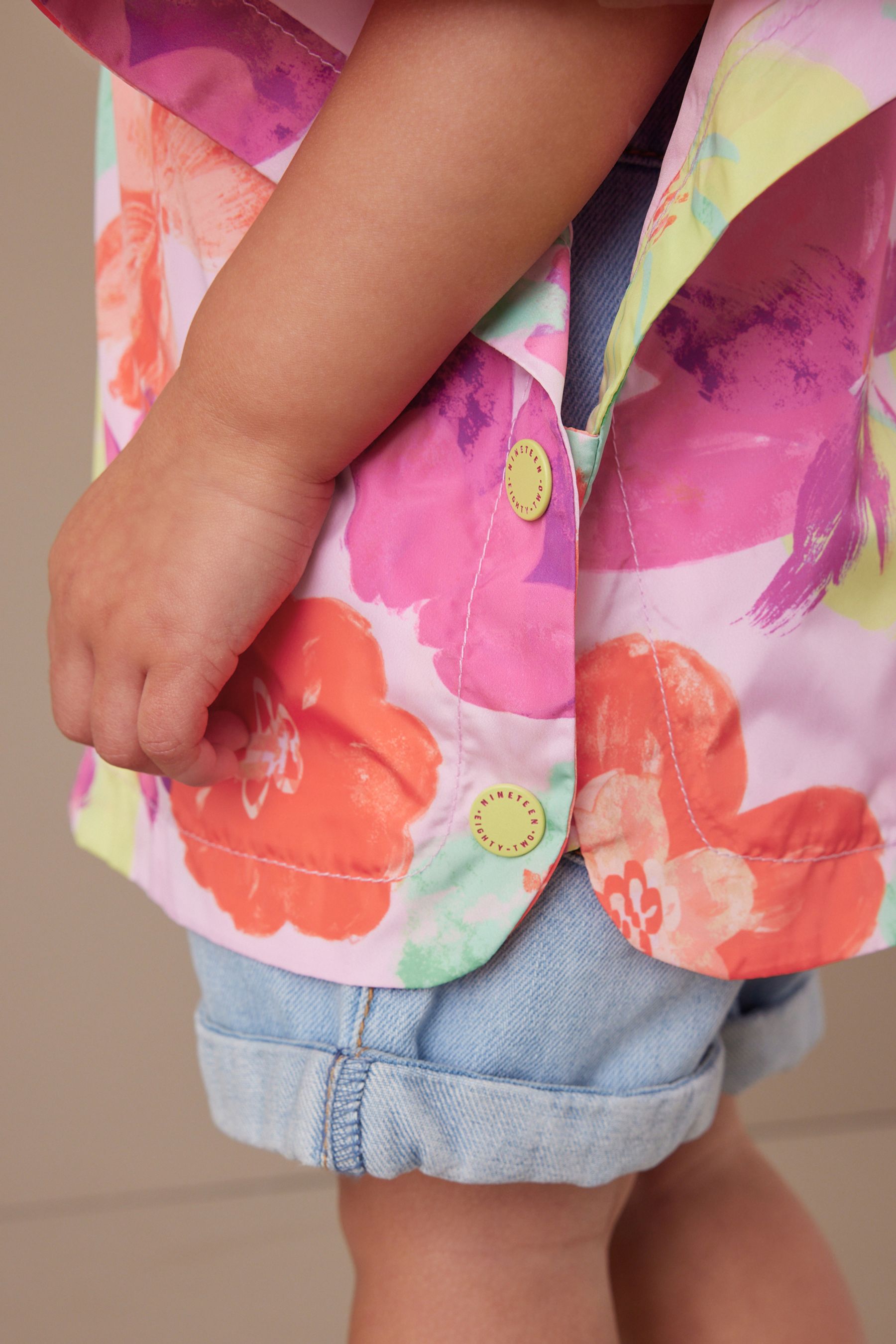 Multi Floral Shower Resistant Overhead Printed Pack Away Poncho Cagoule (3mths-7yrs)