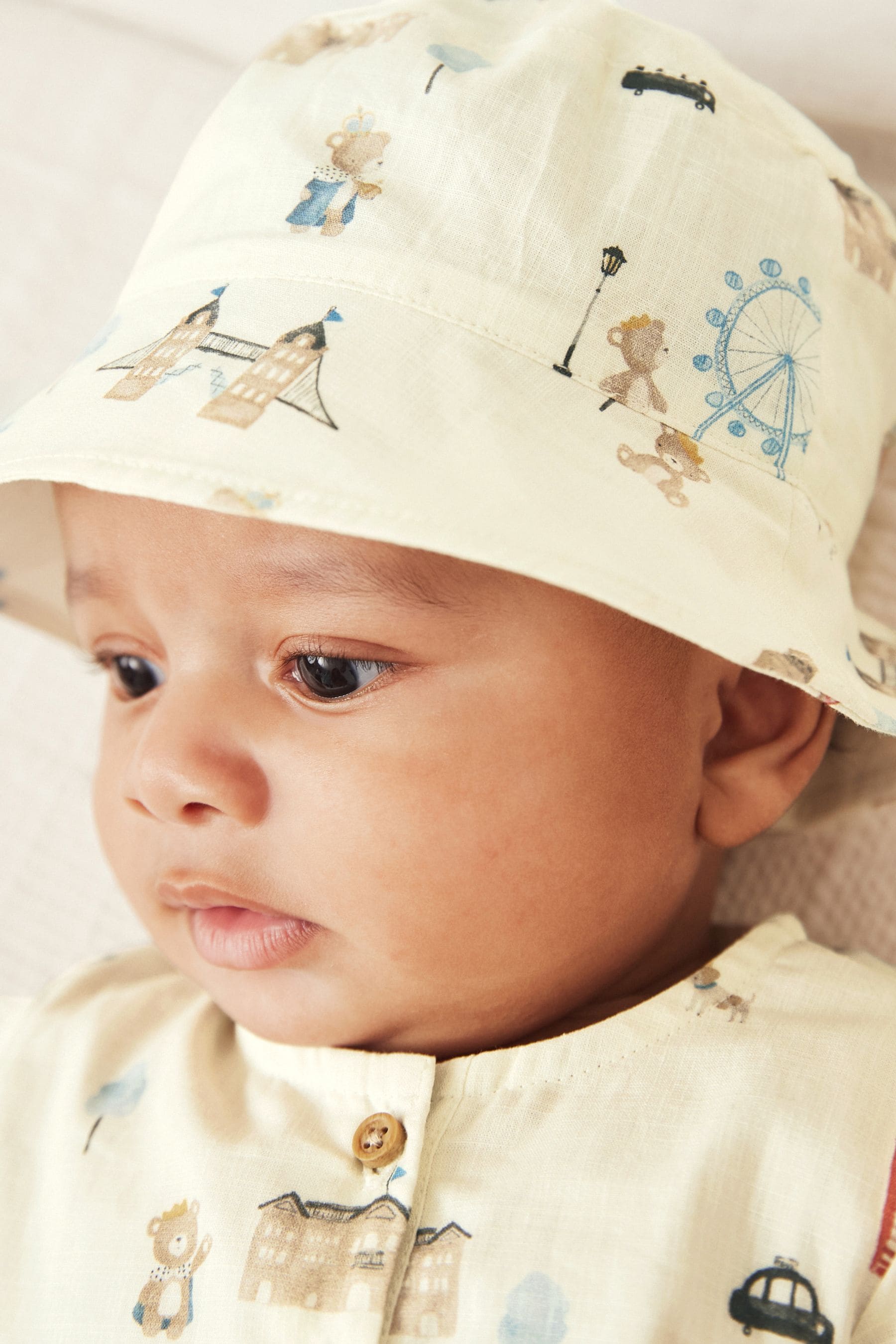 Cream 2 Piece Woven London Print Playsuit and Hat (0mths-2yrs)