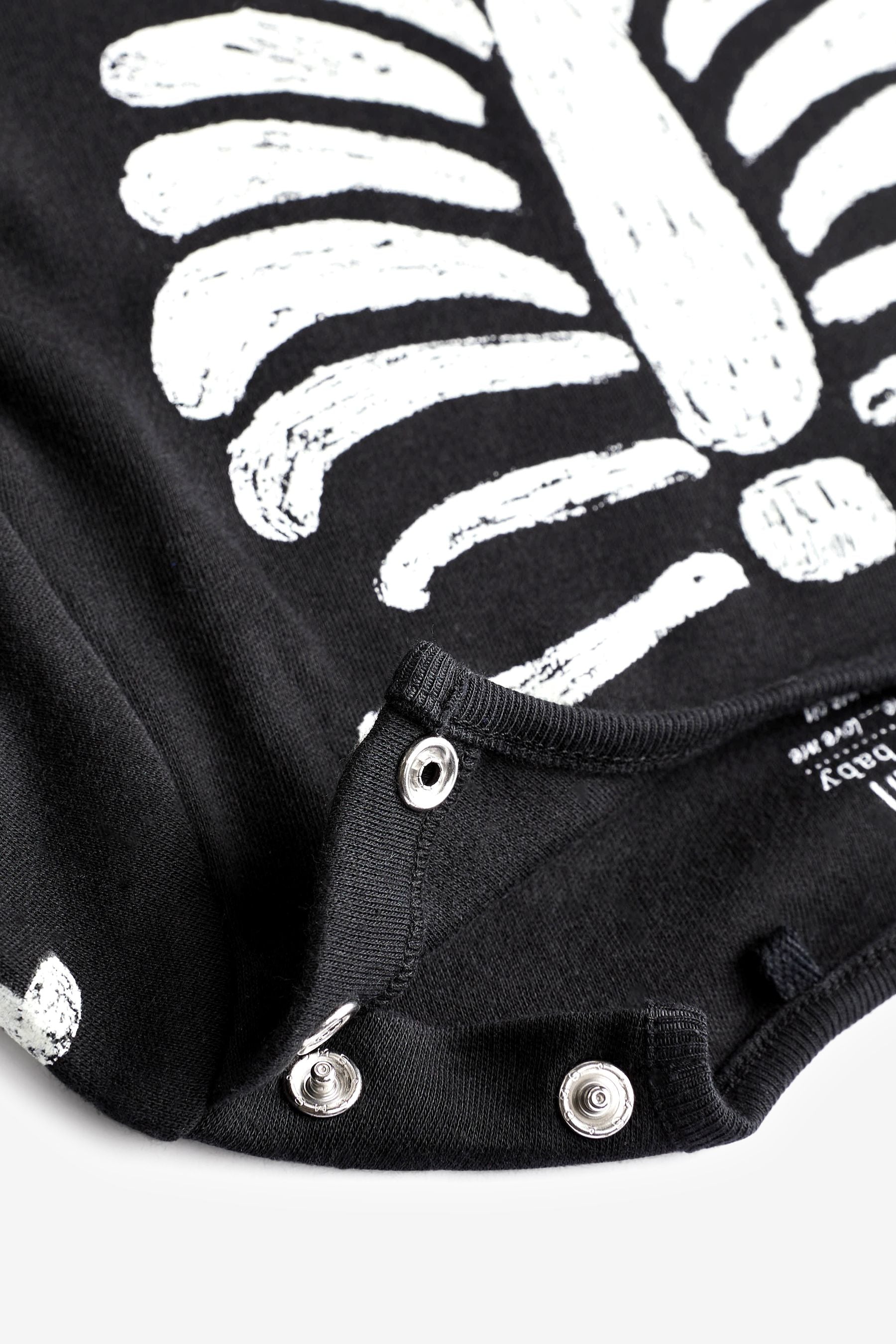 Black Skeleton Glow in The Dark Halloween Footless Sleepsuit (0mths-3yrs)