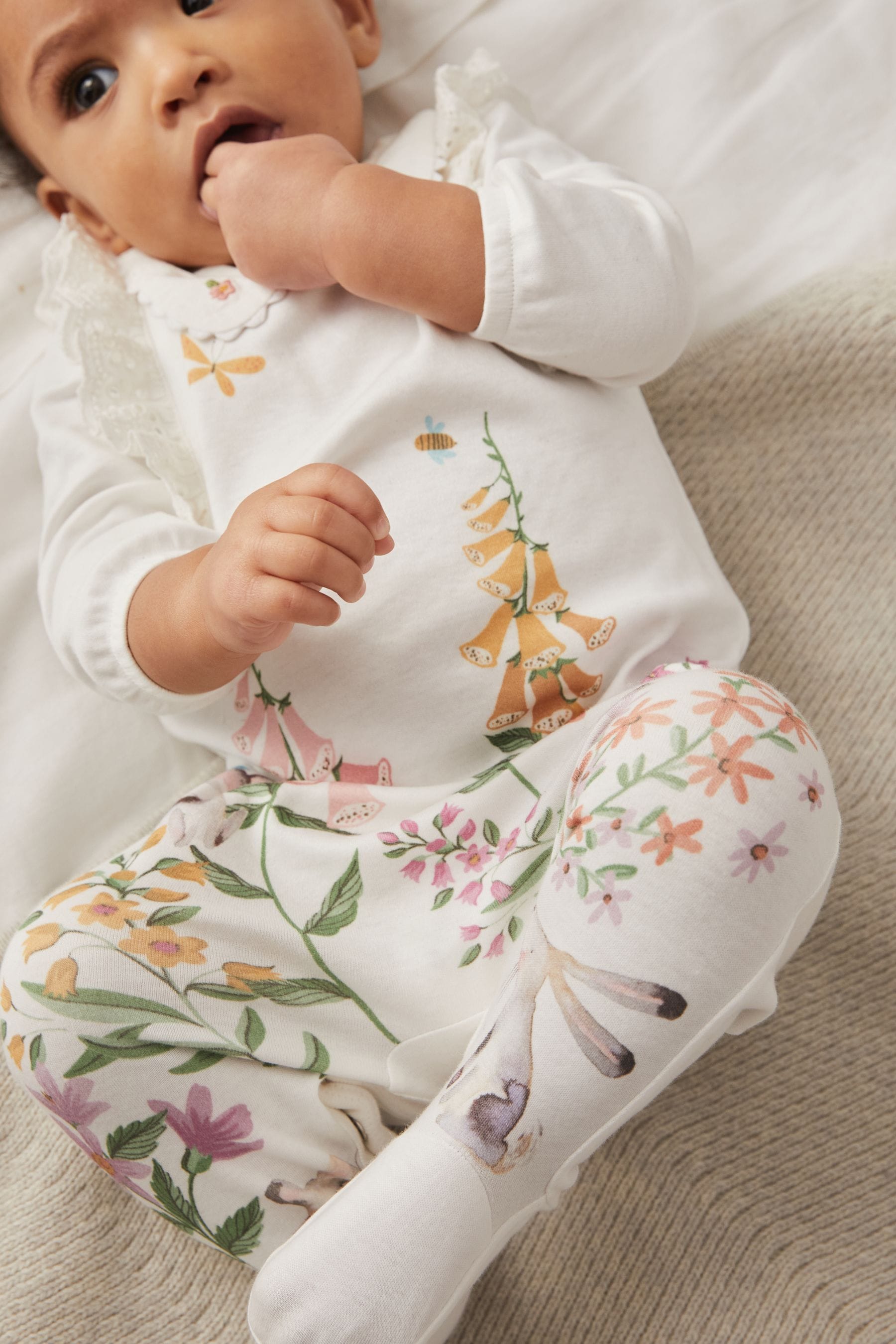 White Floral Baby Single Sleepsuit (0mths-2yrs)