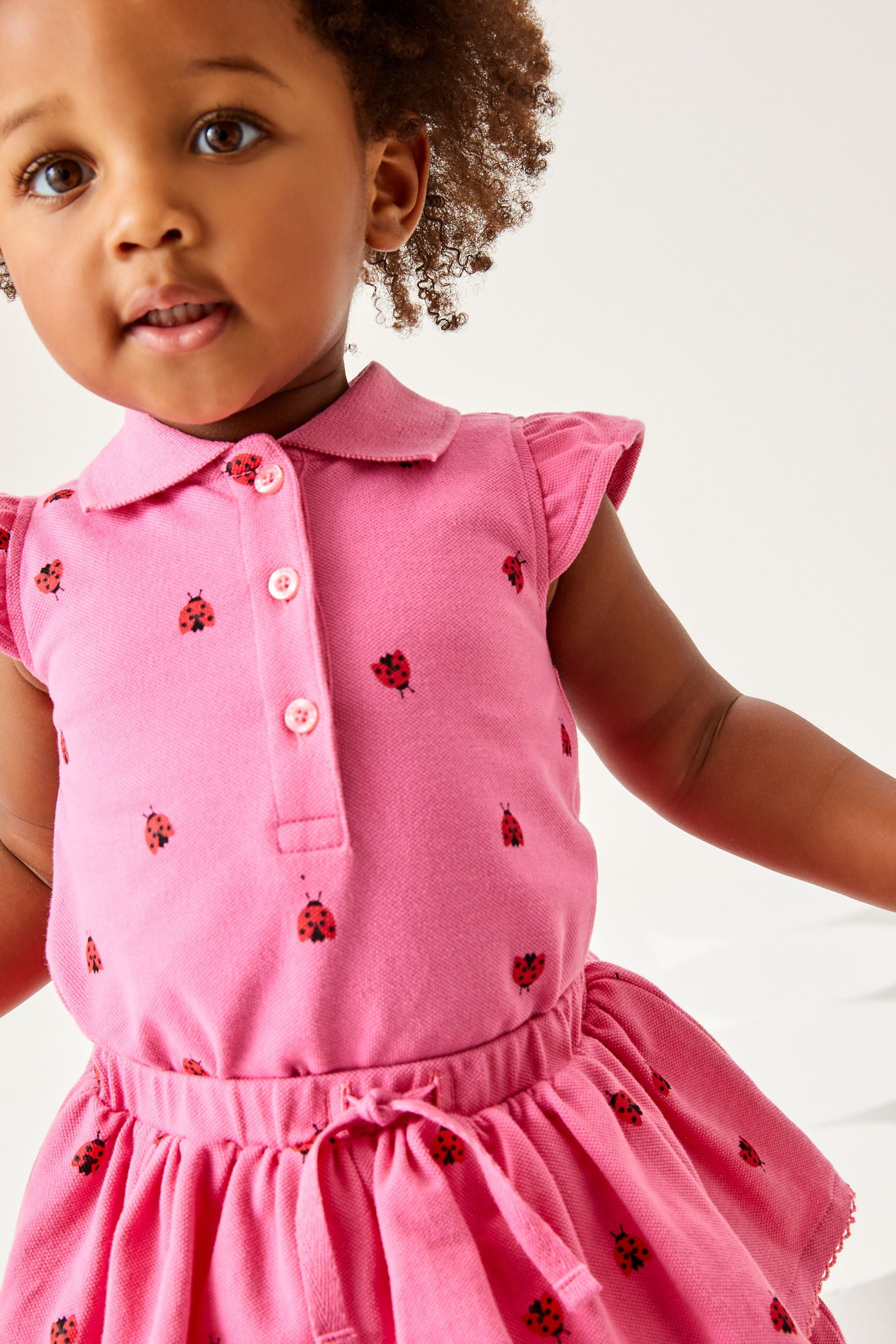 Pink 2 Piece Pique Top And Skirt Set (3mths-7yrs)