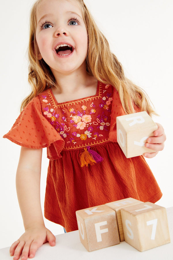 Burnt Orange Jersey Tassel Blouse (3mths-7yrs)