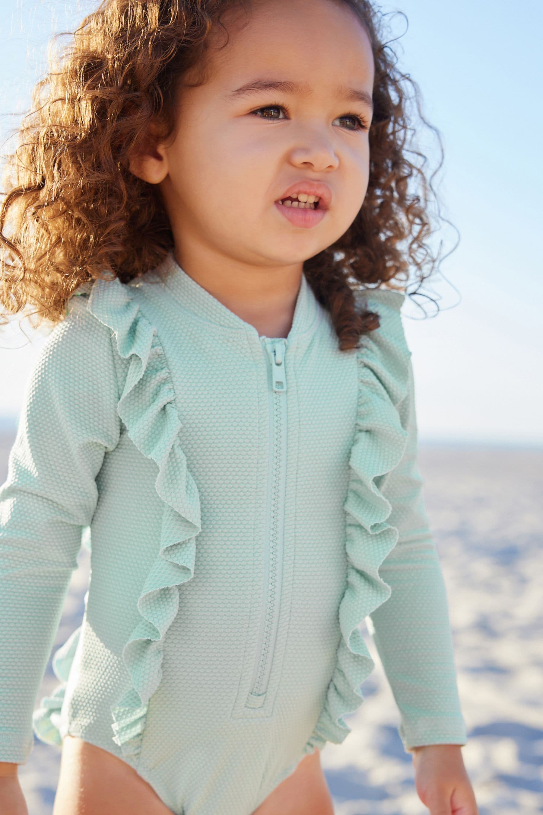 Blue Long Sleeve Textured Frill Swimsuit (3mths-7yrs)