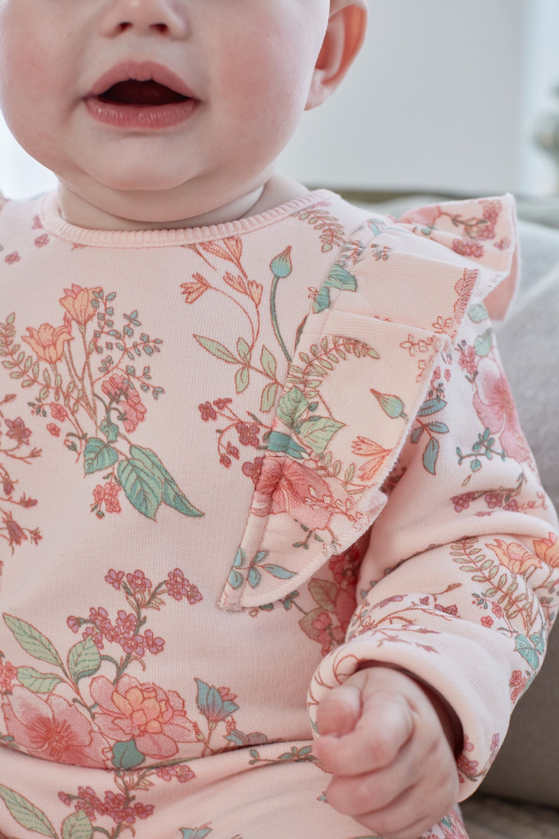 Pink Floral Brushed Back Baby Romper with Frills