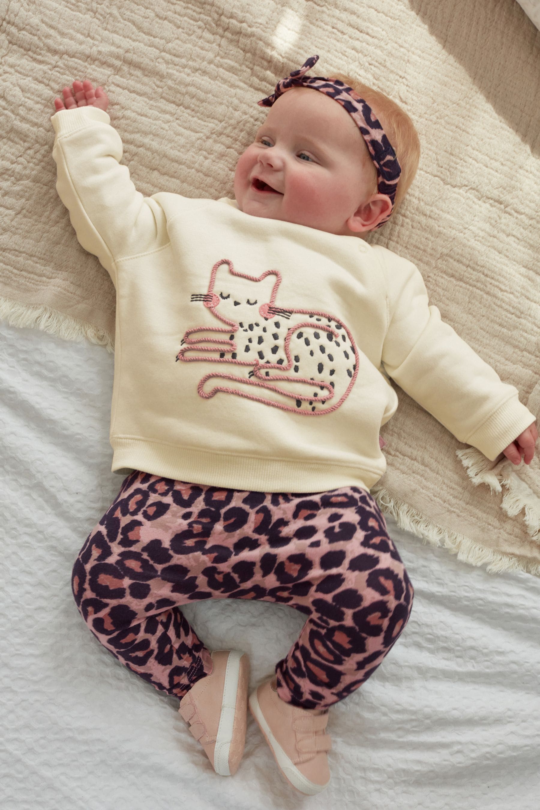 Animal Print 4 Piece Baby Sweater, Top, Leggings And Headband Set