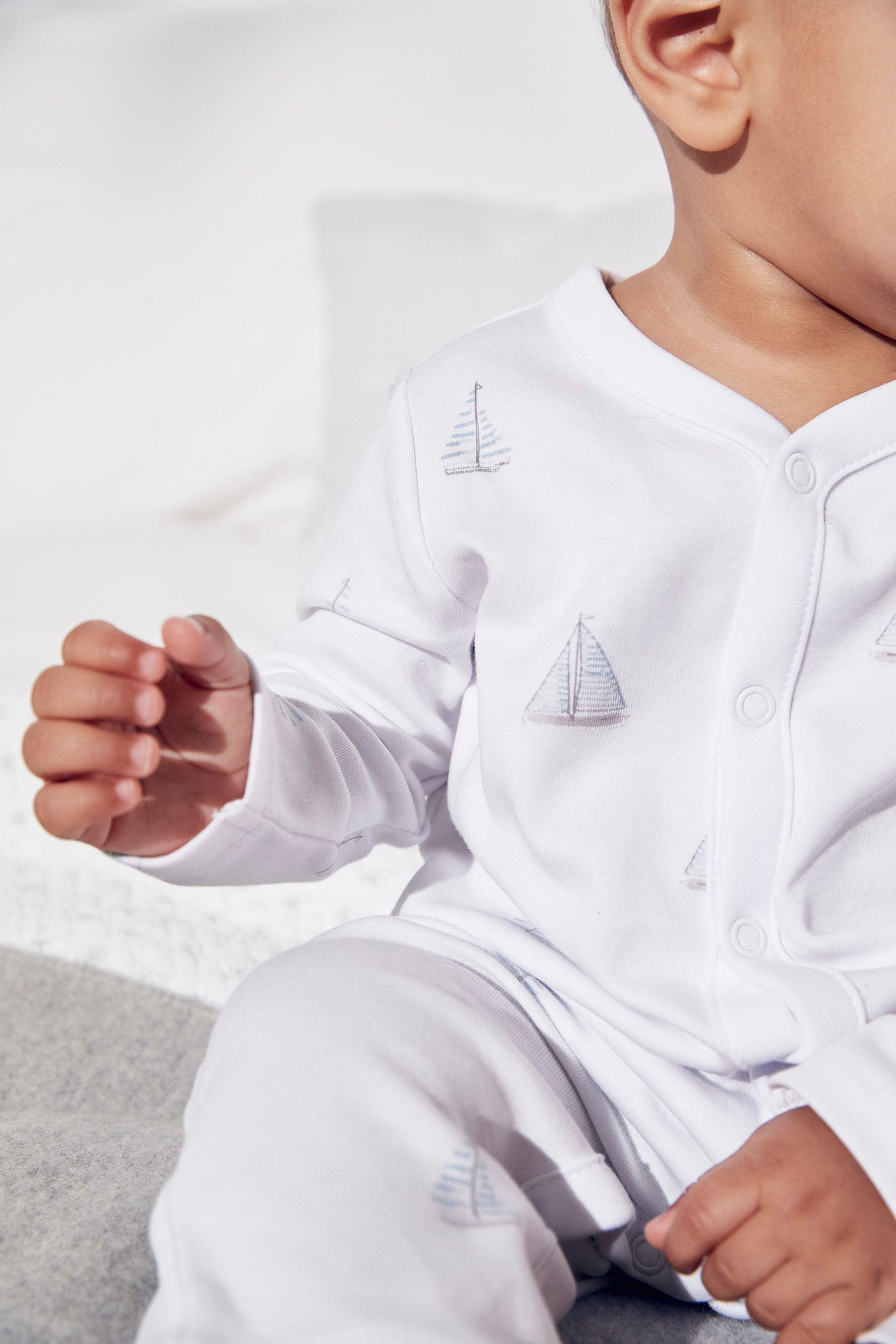 The White Company Boys Blue Boat Print Sleepsuit