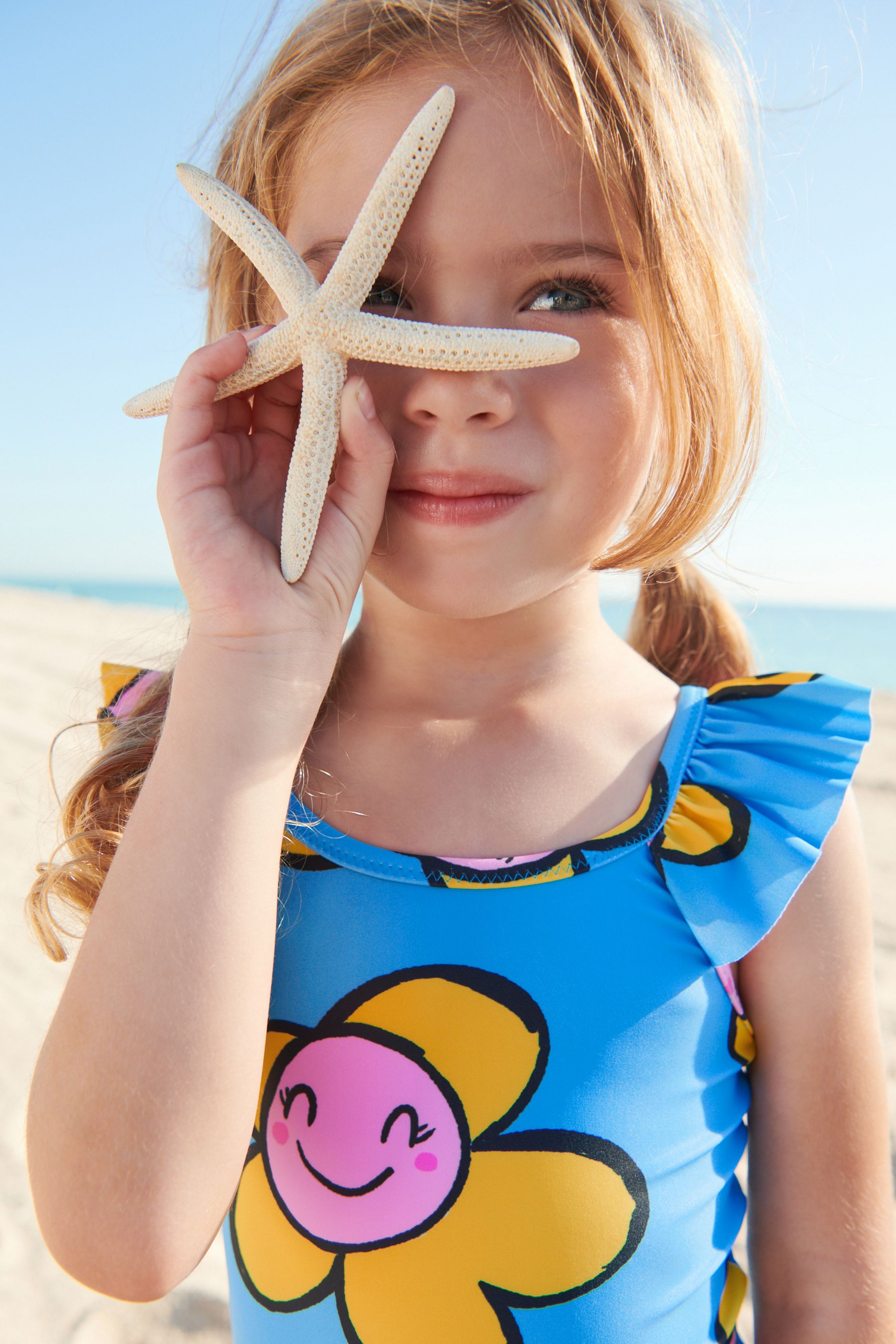 Blue Frill Sleeved Swimsuit (3mths-7yrs)