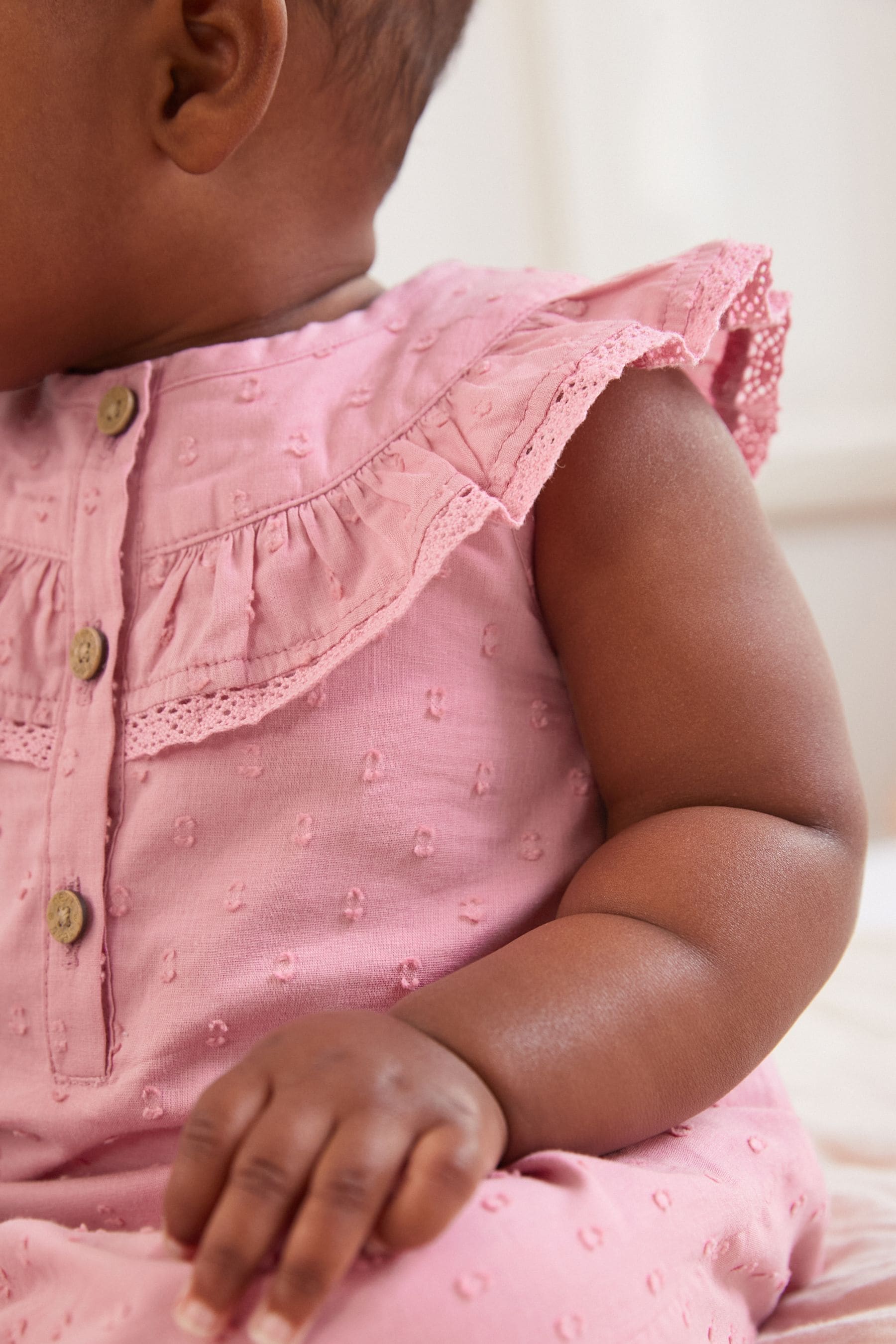 Pink Woven Yoke Frill Baby Jumpsuit (0mths-2yrs)