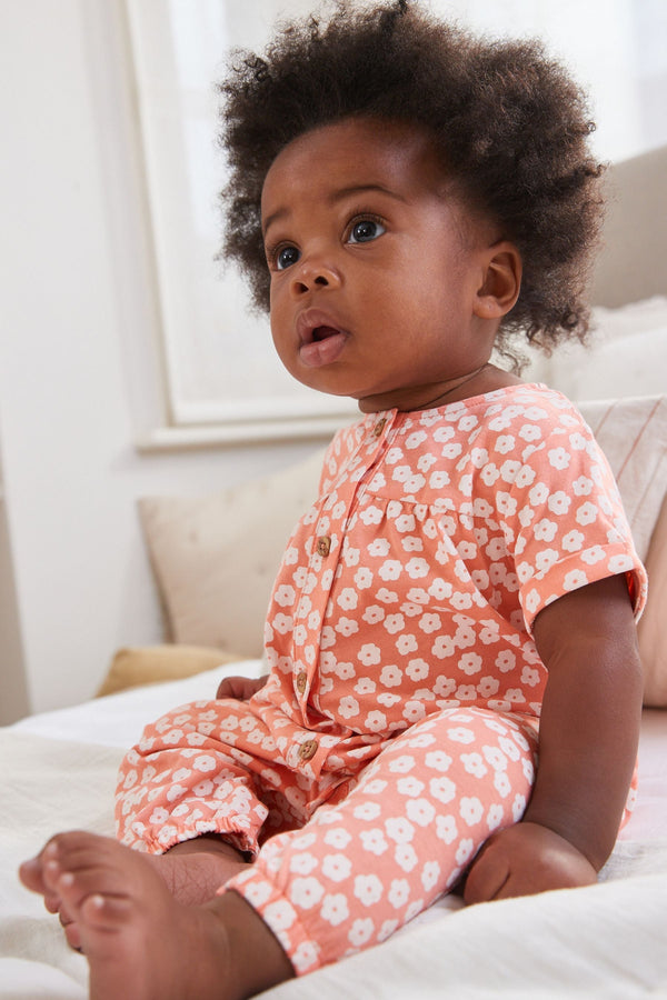 Coral Pink Floral Baby Jersey Jumpsuit (0mths-2yrs)