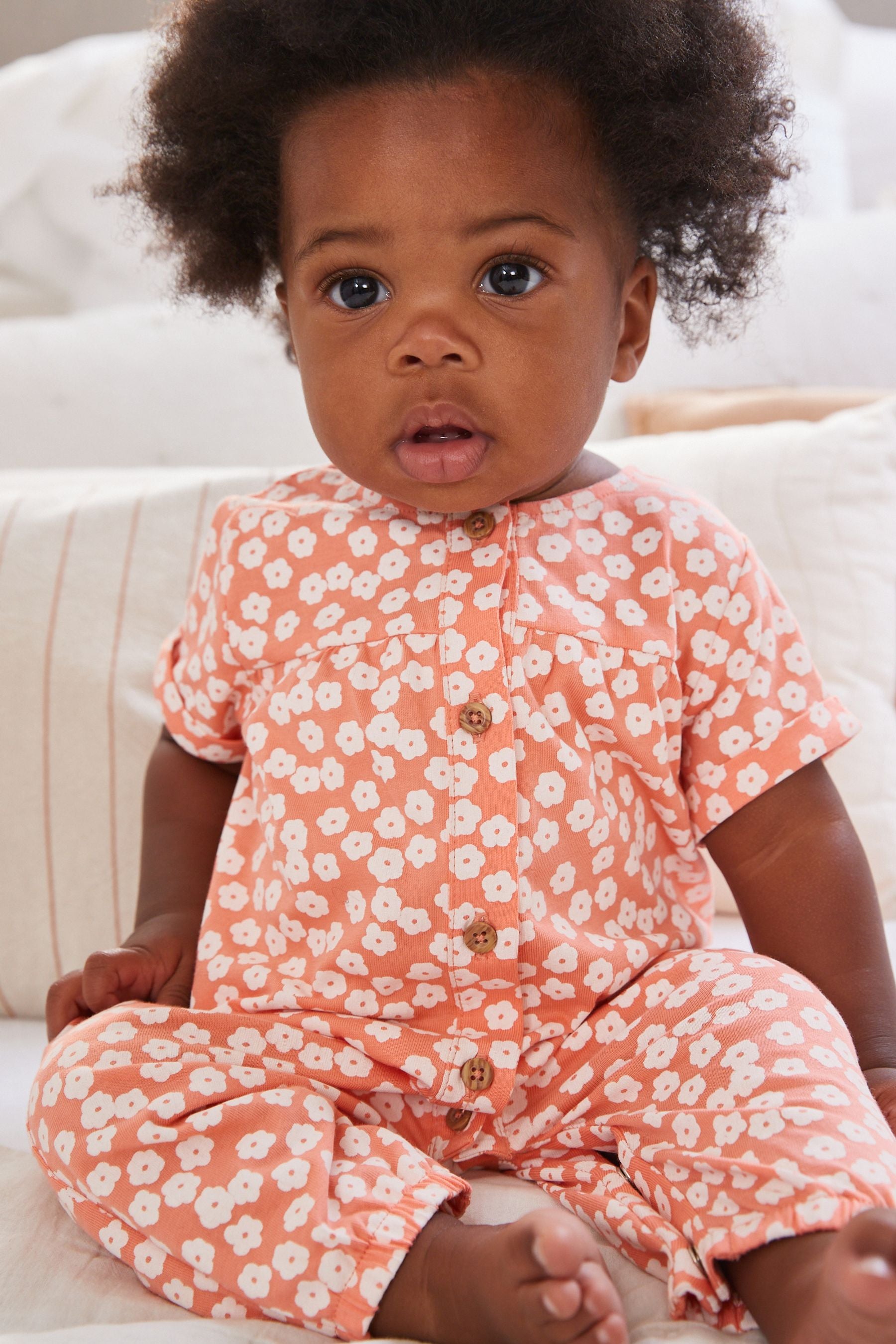 Coral Pink Floral Baby Jersey Jumpsuit (0mths-2yrs)